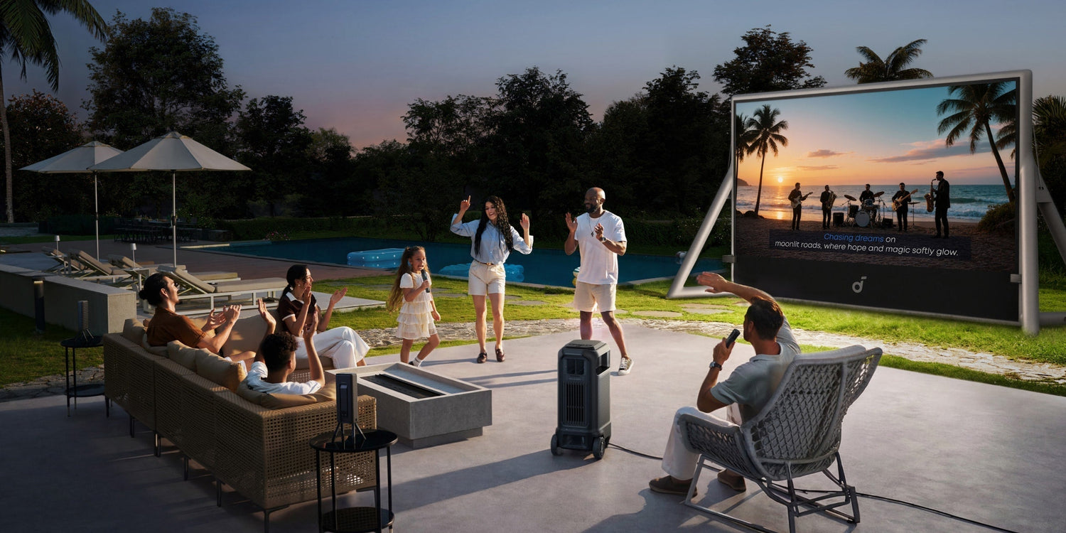 Soundcore Nebula X1 Pro mobile theater station projecting a massive 4K movie onto an inflatable screen during a backyard night party.