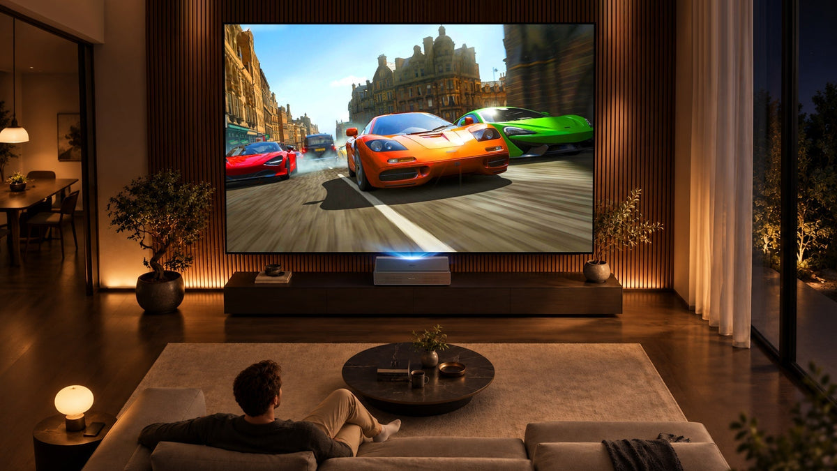 Bright sunlit modern living room with XGIMI AURA 3 Max paired with a 120-inch NothingProjector Fresnel optical screen.
