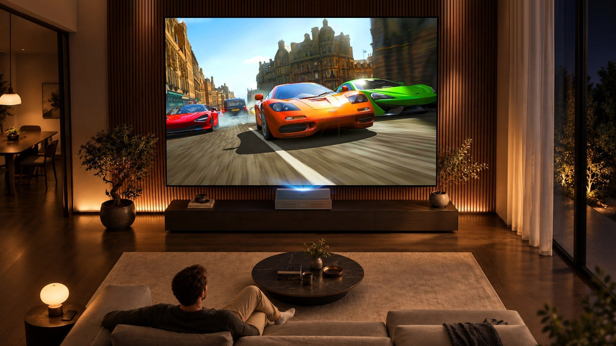 Bright sunlit modern living room with XGIMI AURA 3 Max paired with a 120-inch NothingProjector Fresnel optical screen.