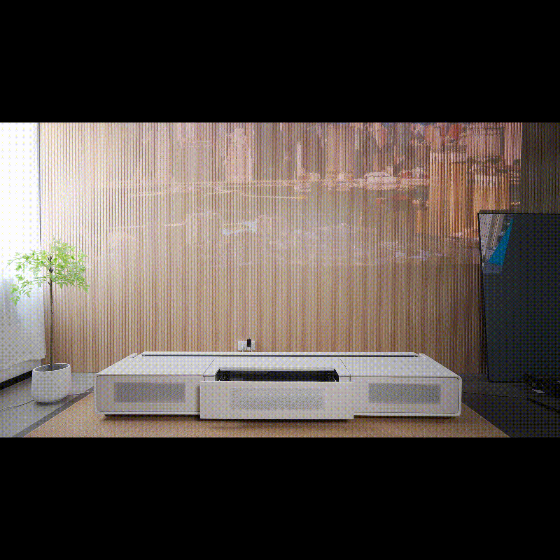 Matte black laser TV cabinet - animated GIF showing smooth sliding doors and modern design from front